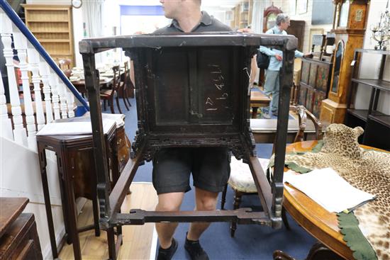 A Chinese huali wood urn stand, having panelled top and pierced frieze W.52cm